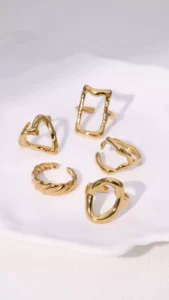 Minimalist gold stainless steel rings collection with geometric and abstract designs, wholesale jewelry by Yanluo Jewelry