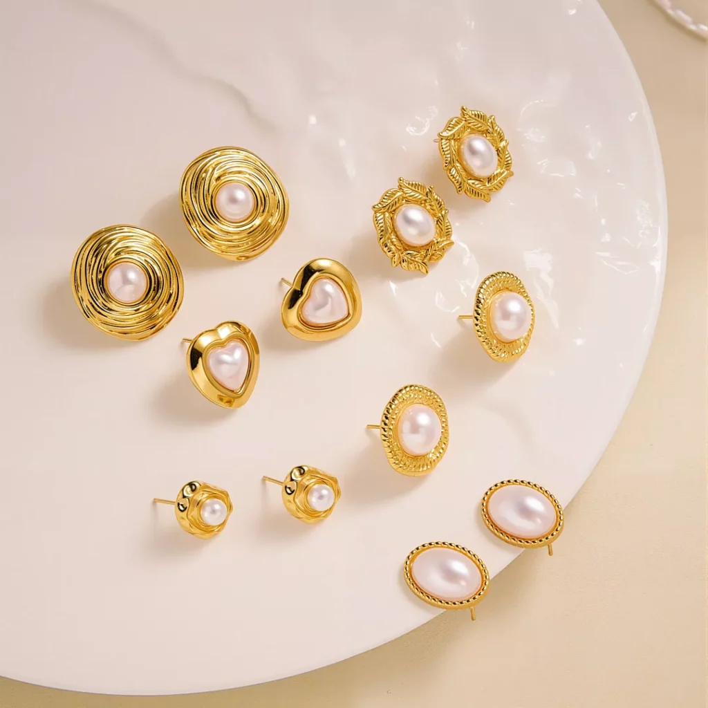 Gold stainless steel pearl stud earrings in multiple elegant designs, wholesale jewelry collection by Yanluo Jewelry