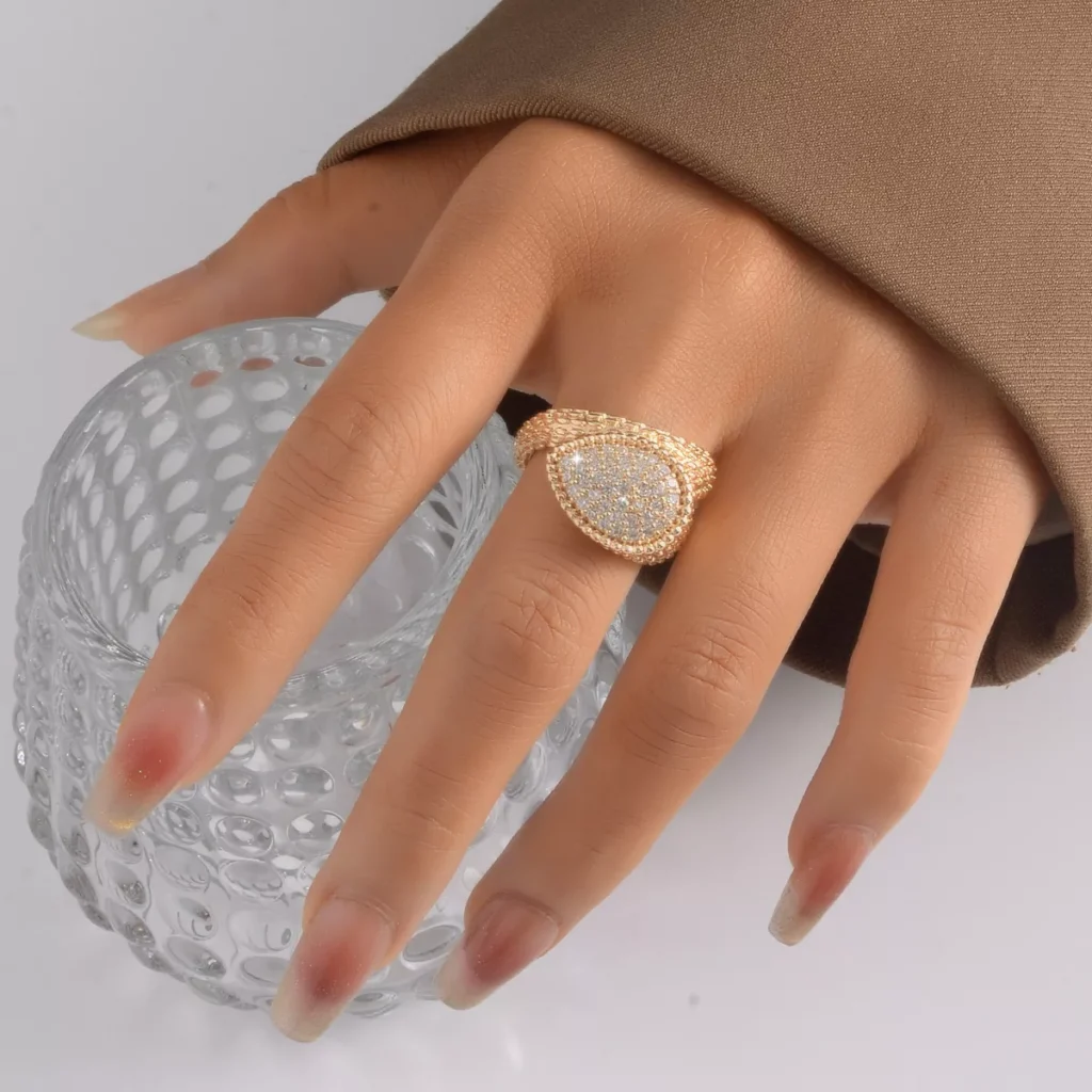 Gold stainless steel teardrop ring with pave cubic zirconia stones, wholesale jewelry collection by Yanluo Jewelry