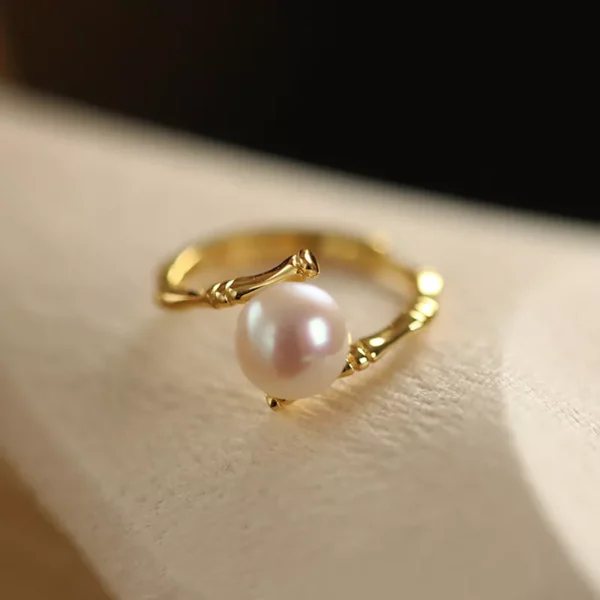 Gold stainless steel pearl ring with bamboo-textured band, elegant wholesale jewelry by Yanluo Jewelry