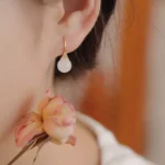 Elegant stainless steel minimalist earrings with jade-style drop for wholesale buyers