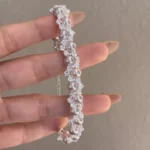 Elegant pearl and zircon inlaid stainless steel bracelet, luxury fashion jewelry from a reliable stainless steel jewelry wholesale supplier