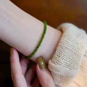 Minimalist stainless steel bracelet with green gemstone beads for wholesale buyers