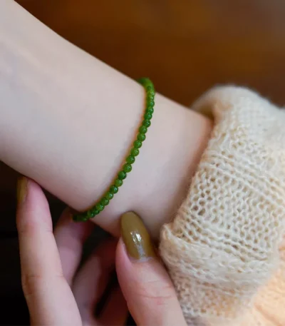 Minimalist stainless steel bracelet with green gemstone beads for wholesale buyers